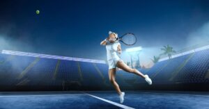 A tennis player surrounded by bright lights hitting a tennis ball seemingly motivated by tennis quotes